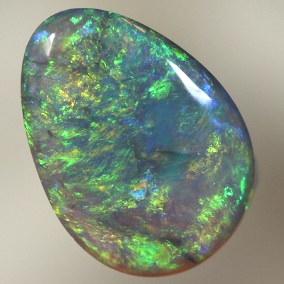 SOLID BLACK OPAL Bright orange and green over blue, always showing colour